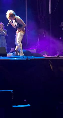 Pissing On A Fan On Stage'