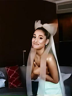 Ariana Grande Holding Her Titties'